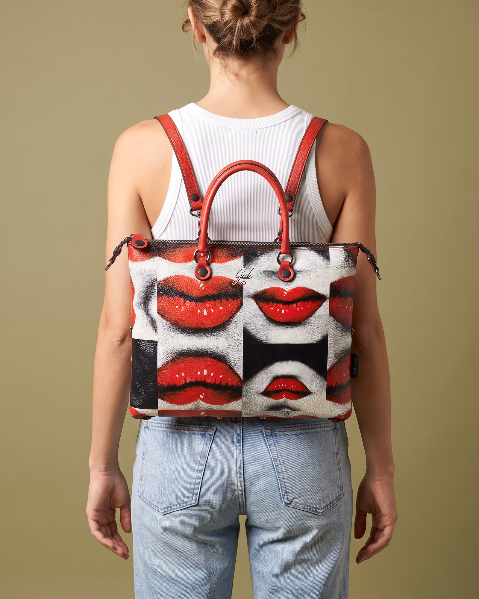 A leather backpack worn over the shoulder